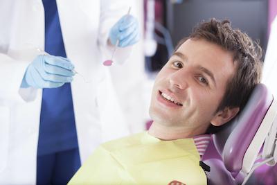 irvine man smiling in dental chair