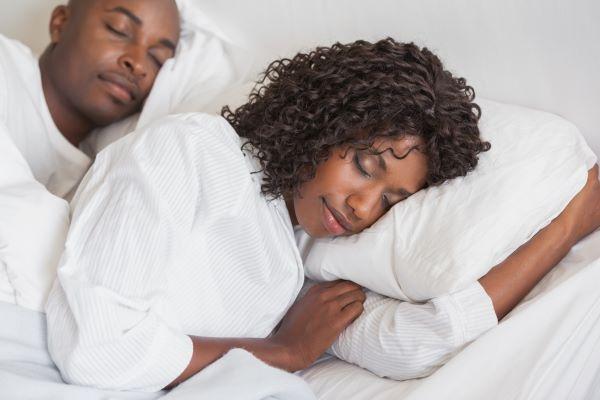 man and woman sleeping soundly