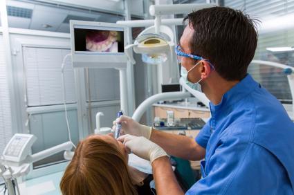 dentist treating patient in irvine