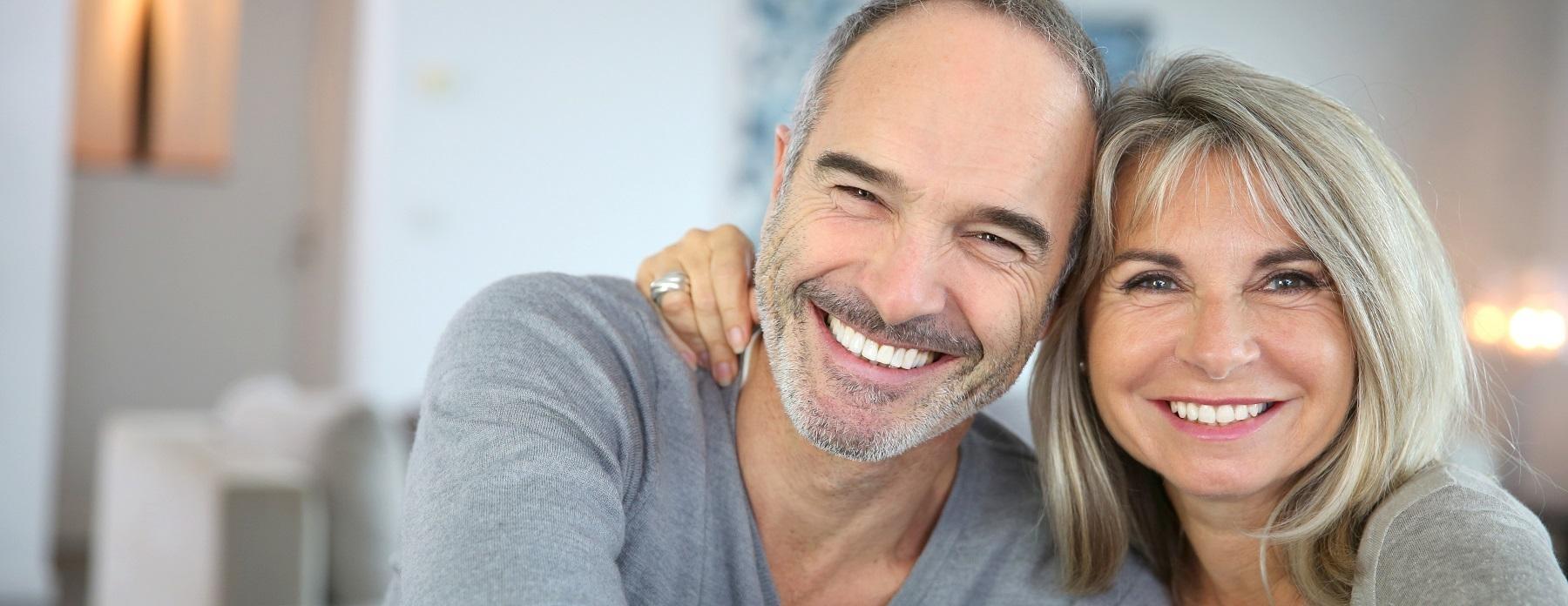 man and woman smiling 