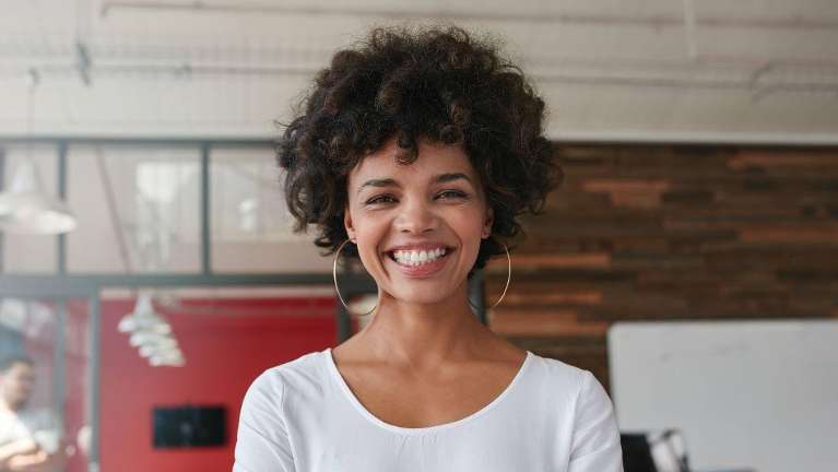 woman smiling after cosmetic dentistry in irvine