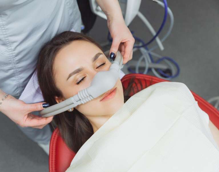 woman getting sedation dentistry in irvine ca