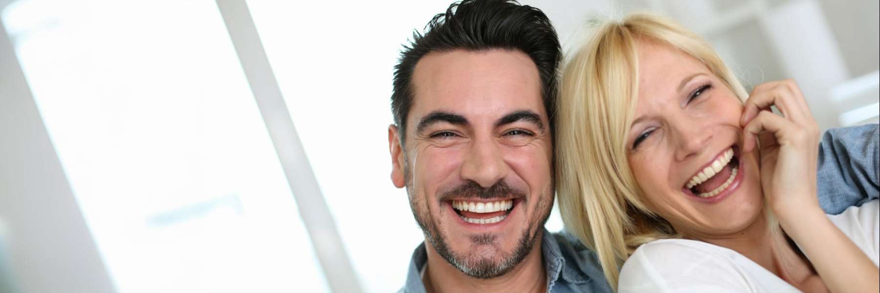 man and woman smiling in irvine ca
